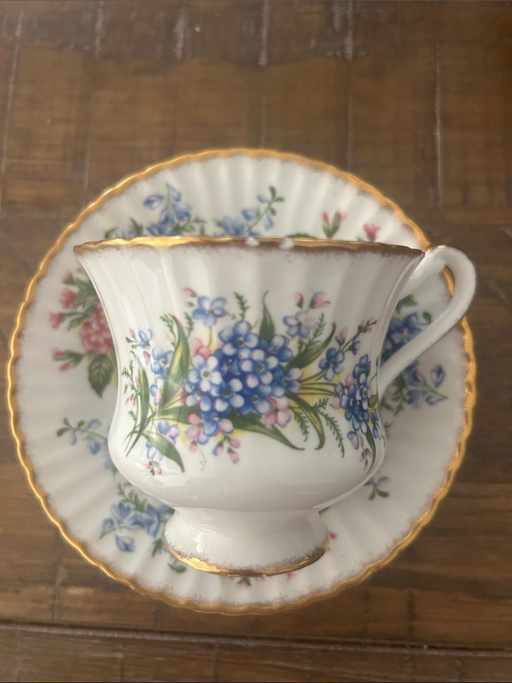 PARAGON Blue, Pink and Green Floral Bone China Teacup & Saucer with Gold Trim